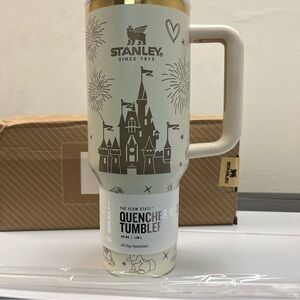 Stanley Cream and Gold Castle-Disney Graphic Quencher Tumbler with Handle